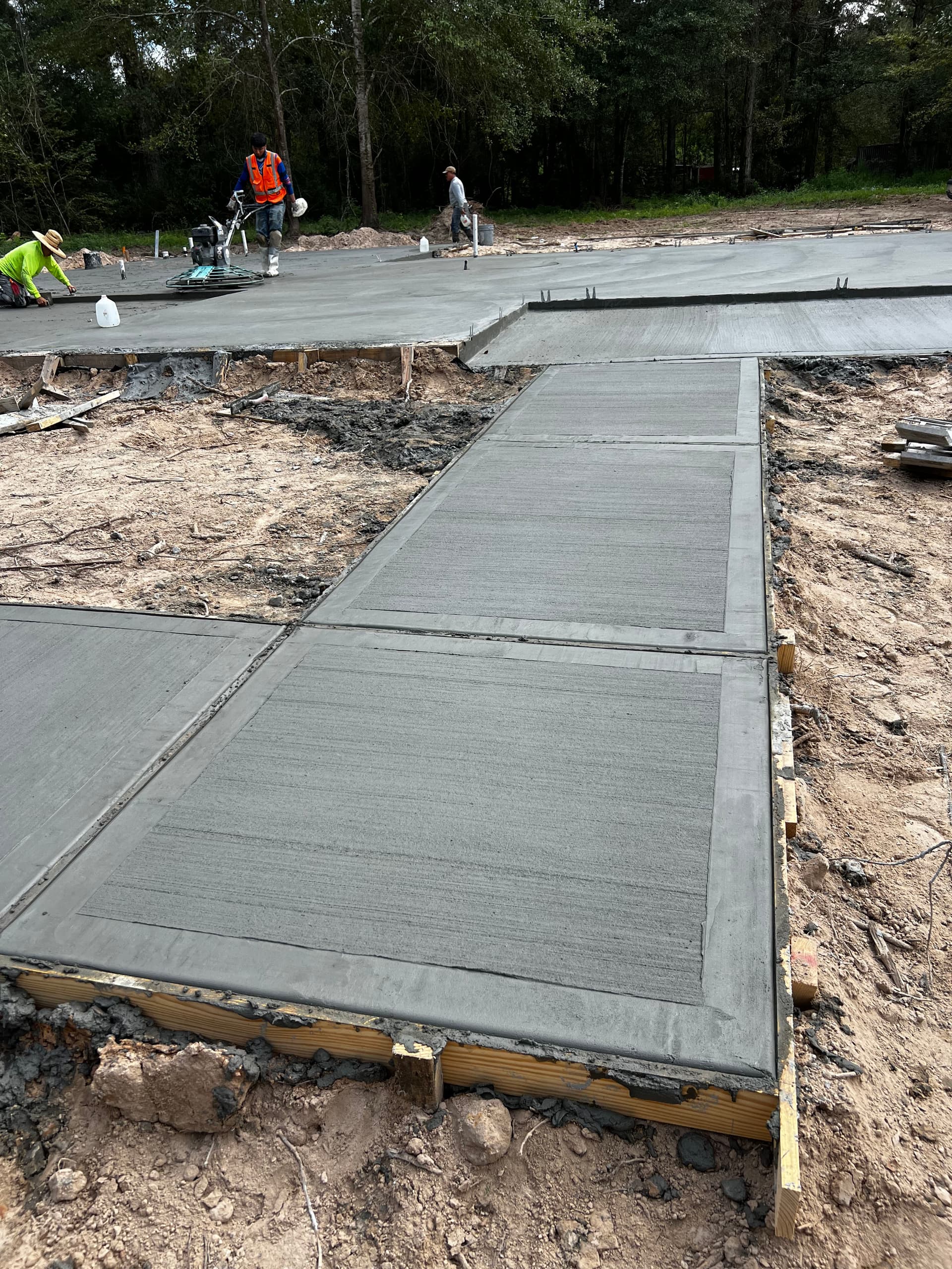 New Driveway and Sidewalk Poured for a New Build Property