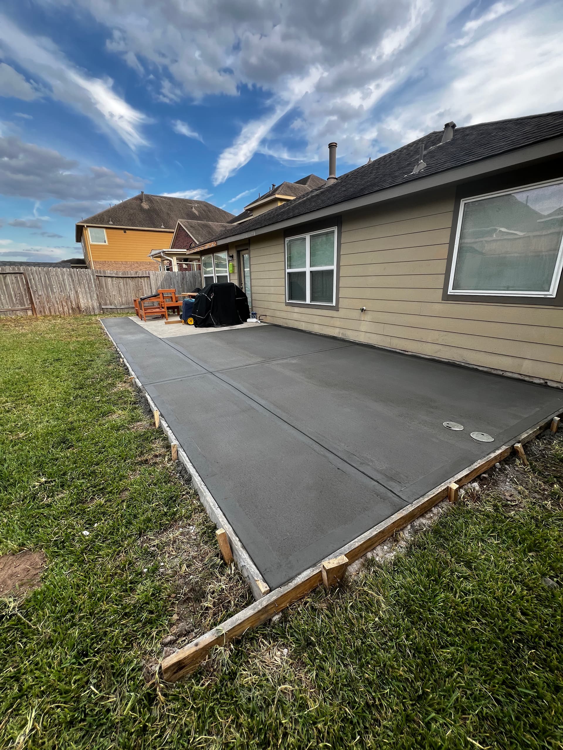 Concrete Patio Extension Adds Real Backyard Space Fast