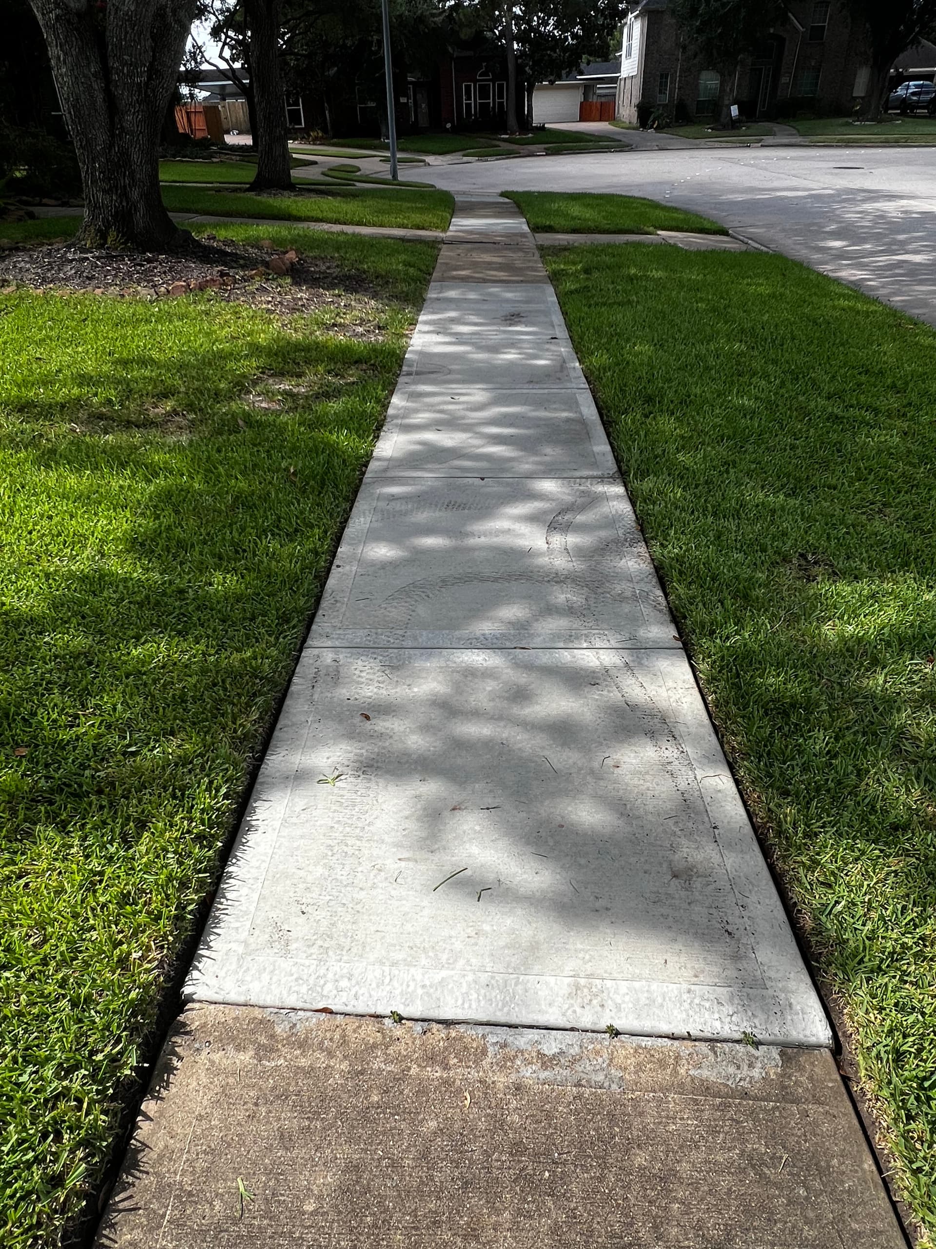 Gallery photos for Cracked Sidewalk Replaced With Clean Concrete Walkways: Image #1