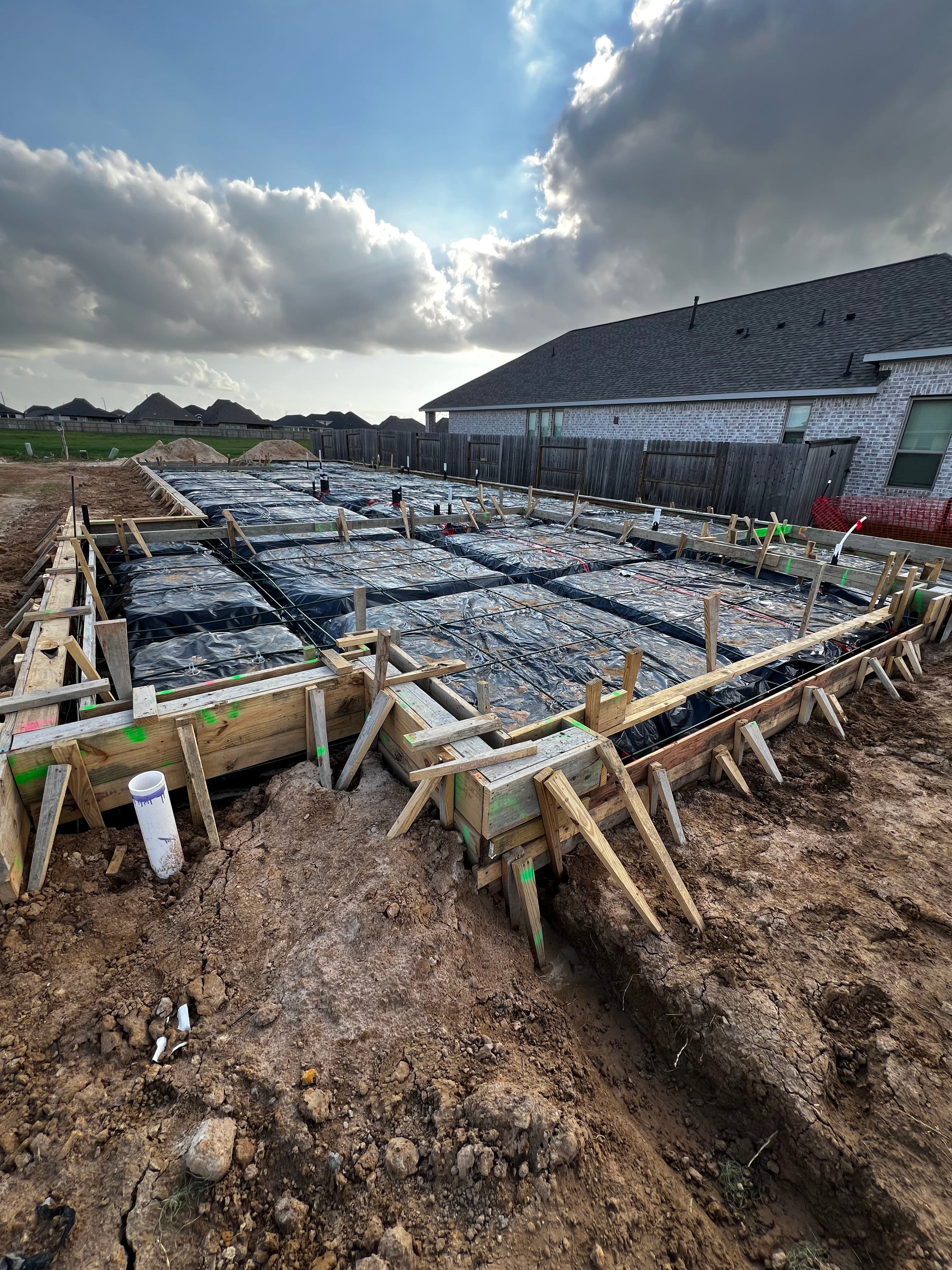 Project New Home Build Foundation Poured Clean and Ready to Frame image
