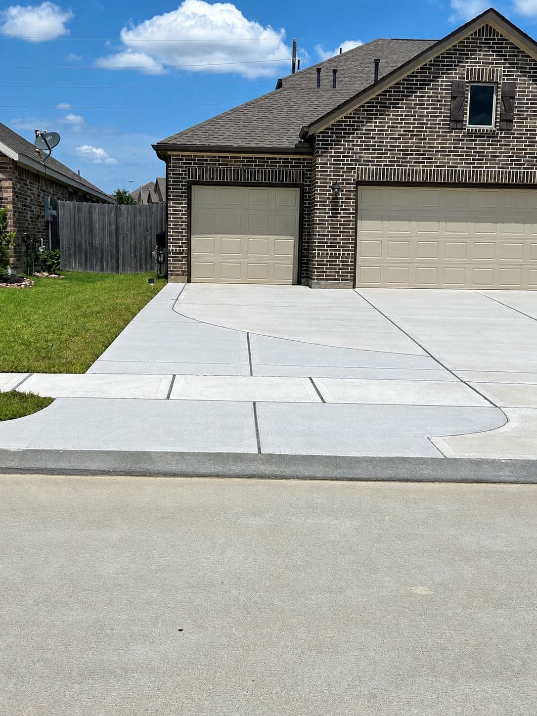 Gallery photos for Concrete Driveway Expansion Built for Real Life: Image #1