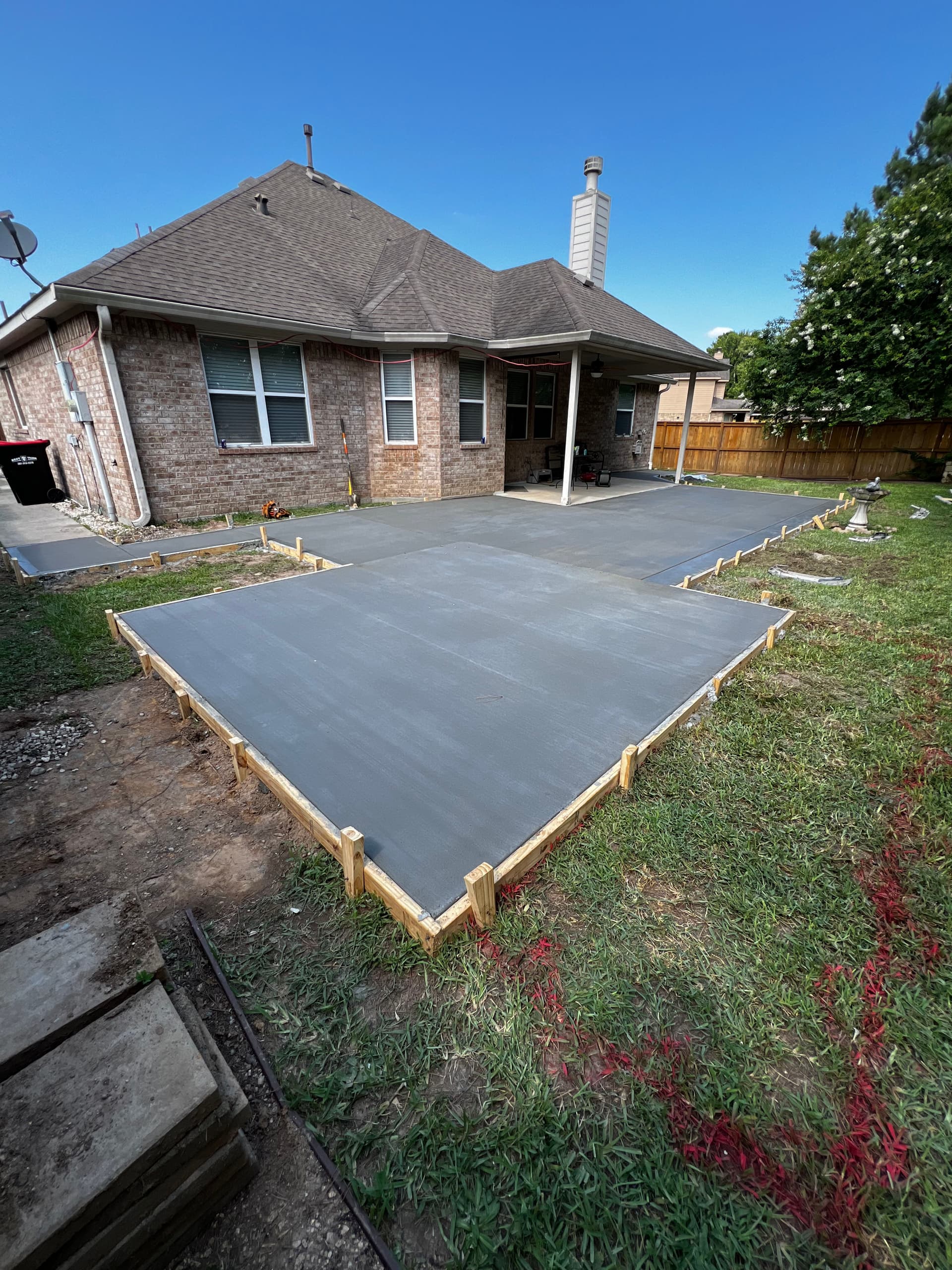 Backyard Concrete Patio and Shed Slab Done Right image