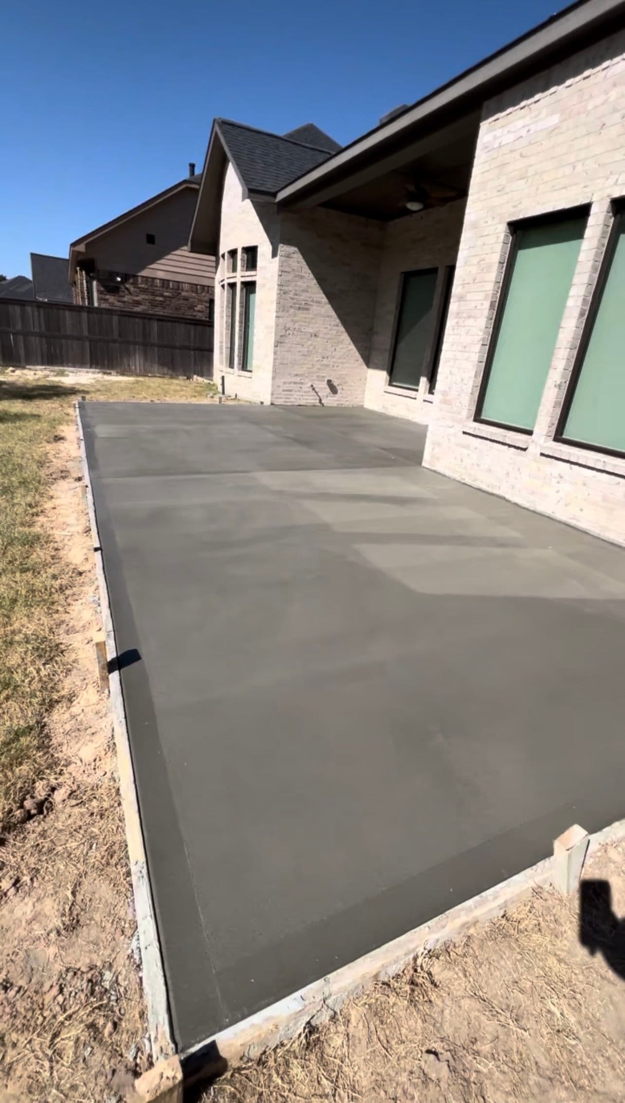Concrete Patio Extension with a Seamless Overlay Finish image