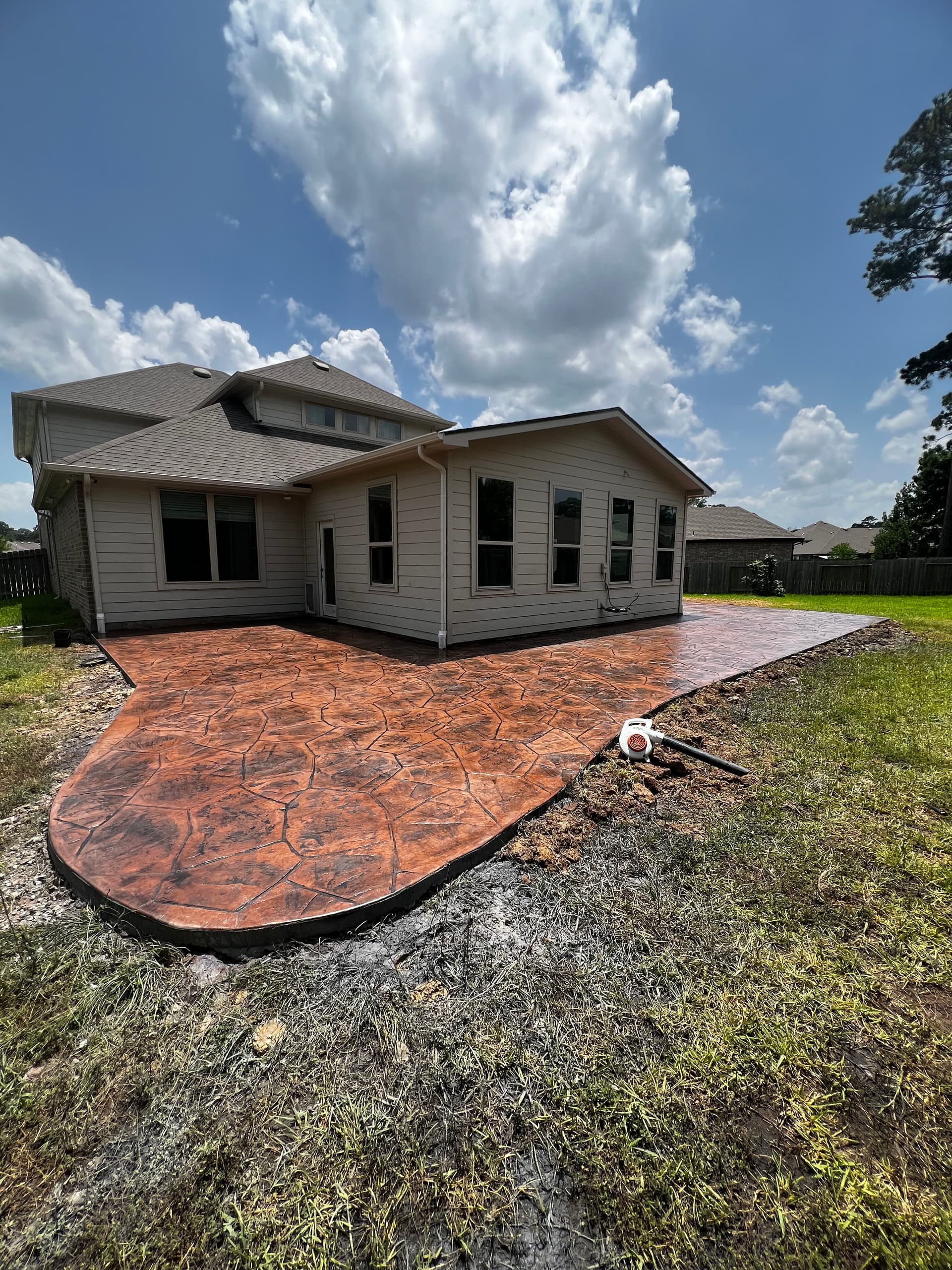 Gallery photos for Backyard Goes From Bare Dirt to Stunning Stamped Concrete Patio: Image #7
