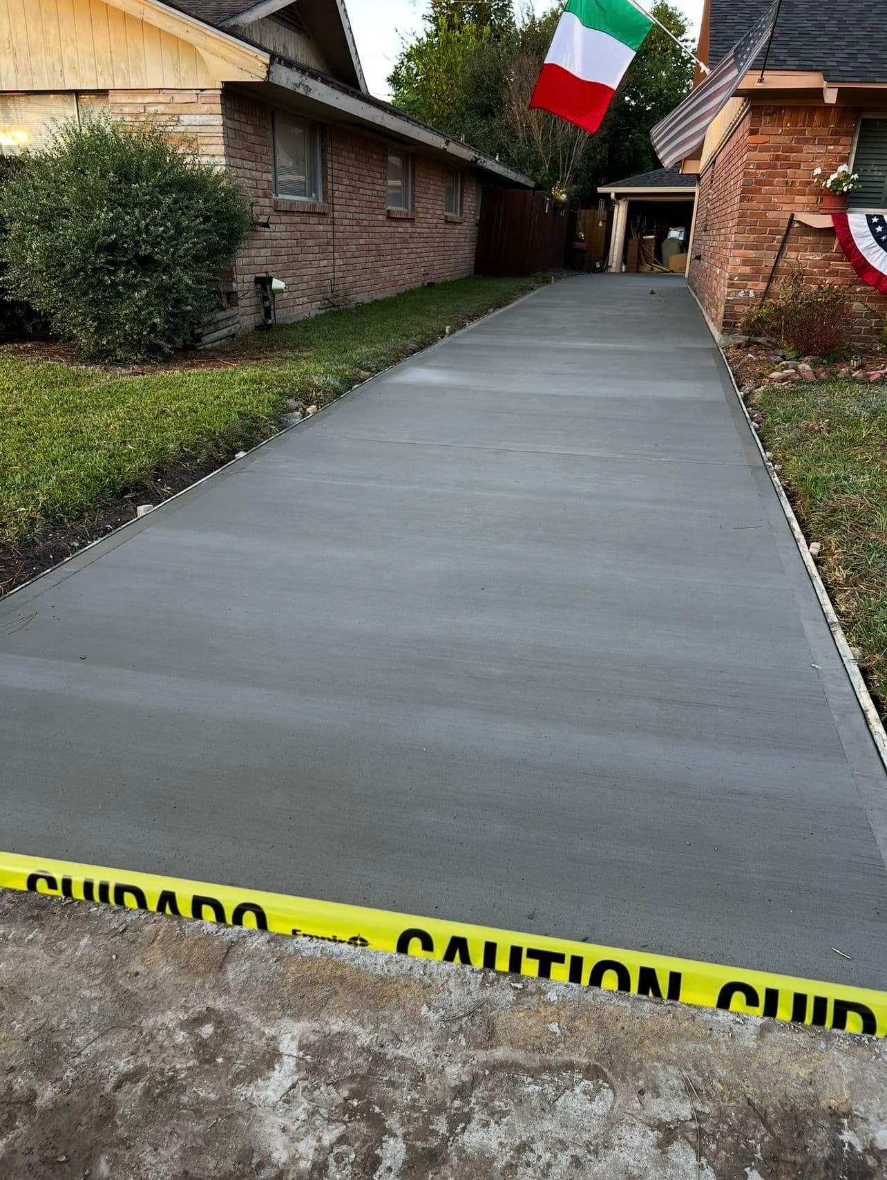 Old Cracked Driveway Gets a Full Concrete Replacement image