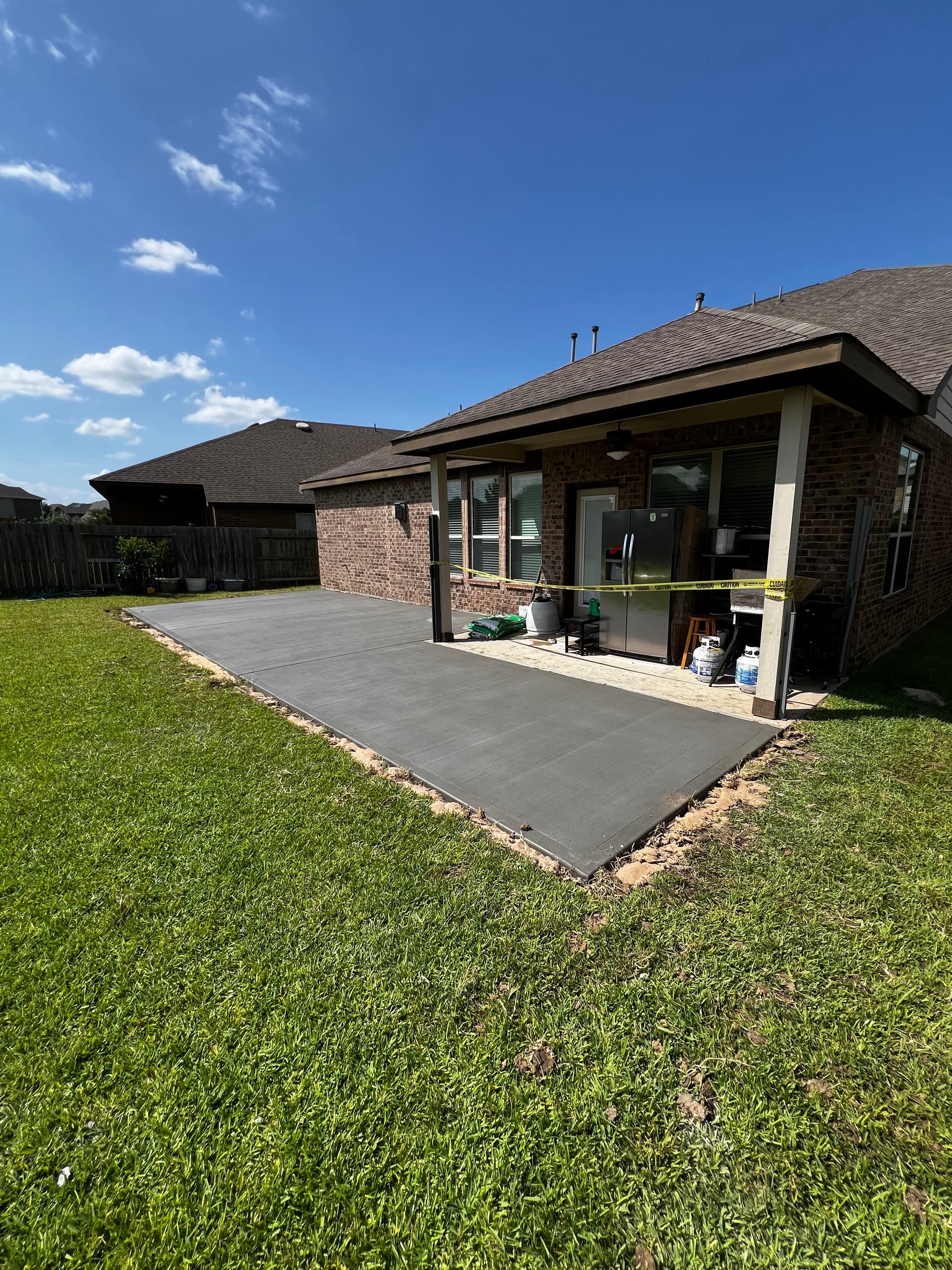 Backyard Patio Extension and Driveway Addition That Actually Gets Used image