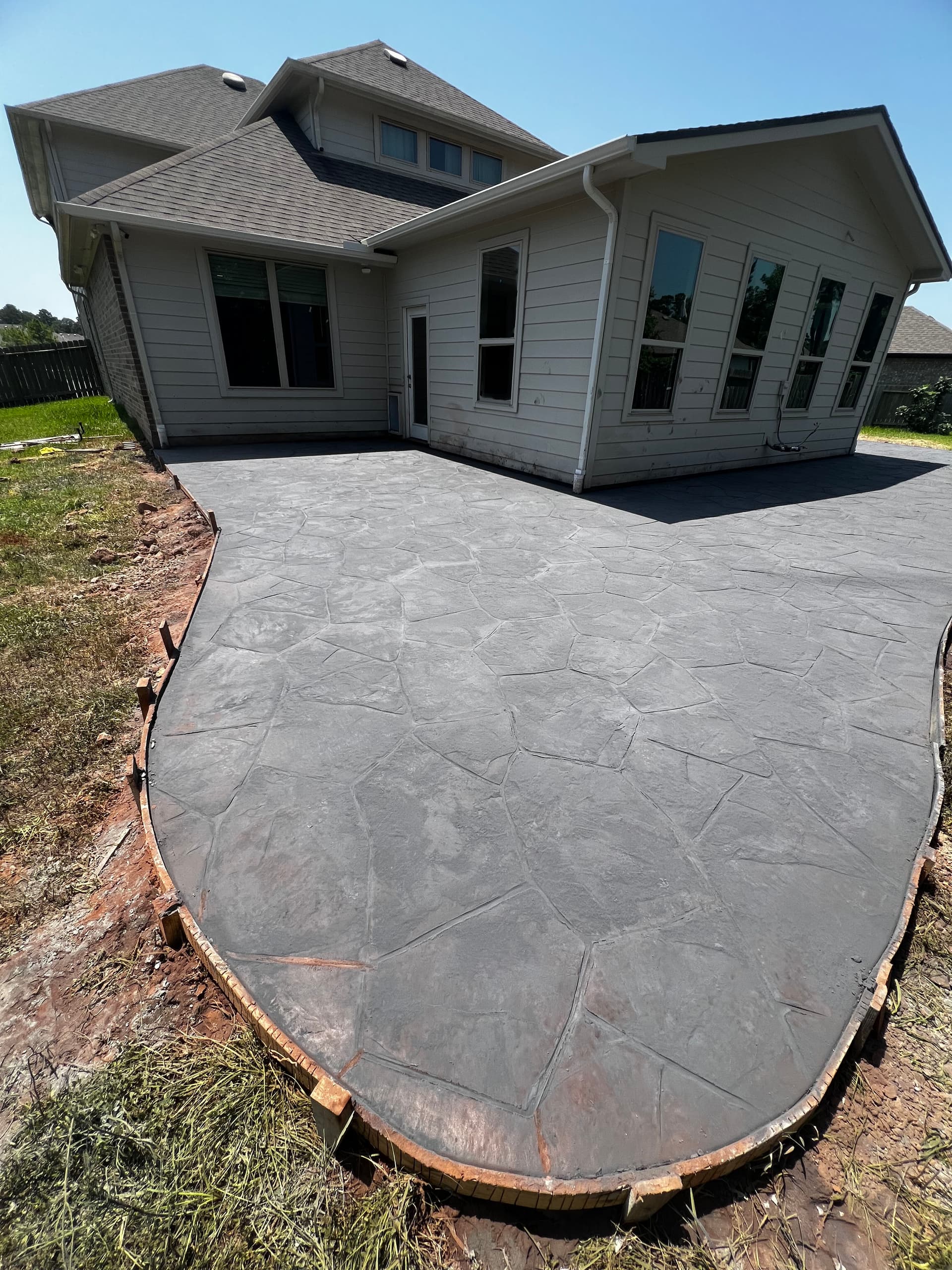 Gallery photos for Backyard Goes From Bare Dirt to Stunning Stamped Concrete Patio: Image #4