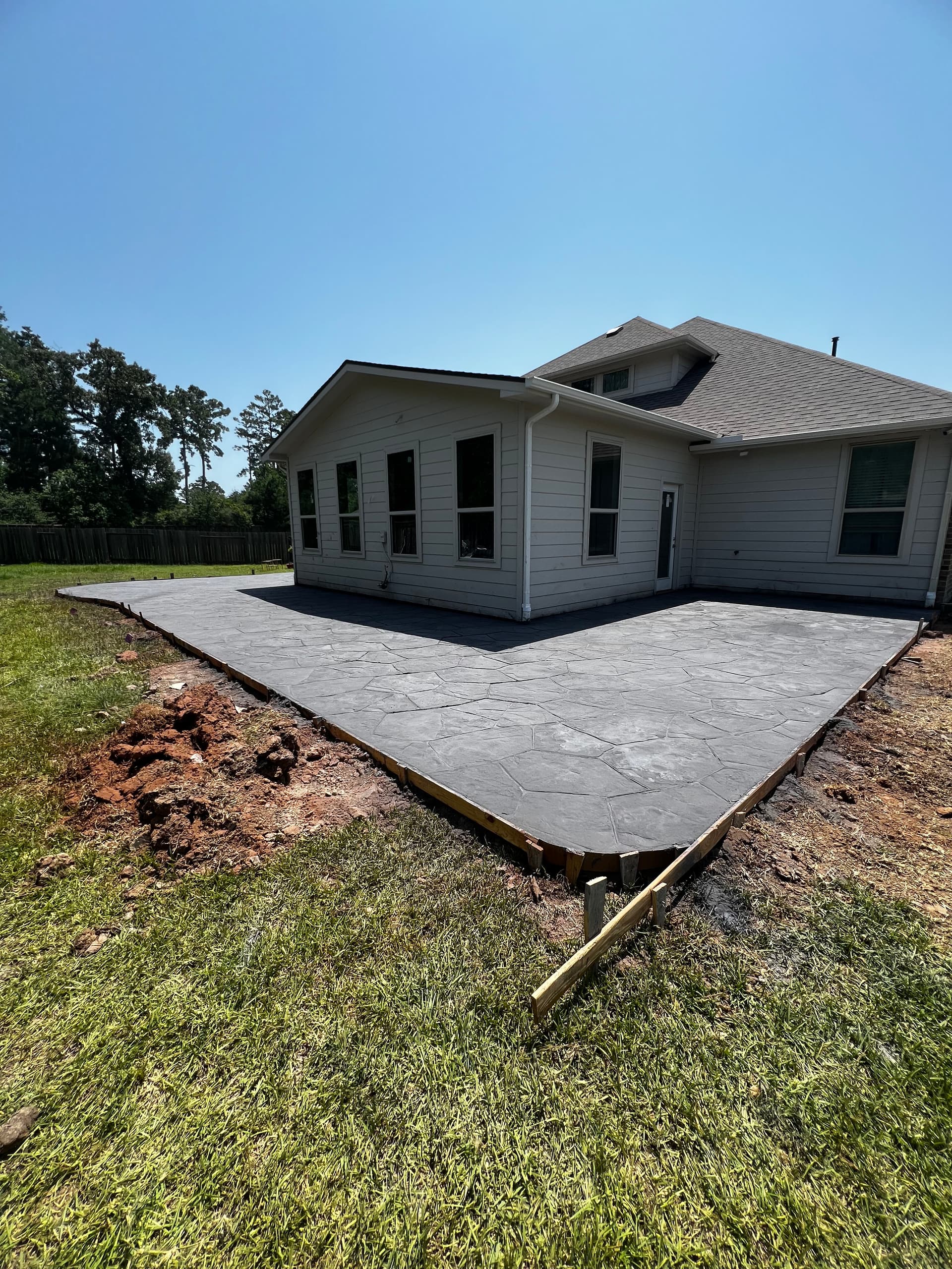 Gallery photos for Backyard Goes From Bare Dirt to Stunning Stamped Concrete Patio: Image #3