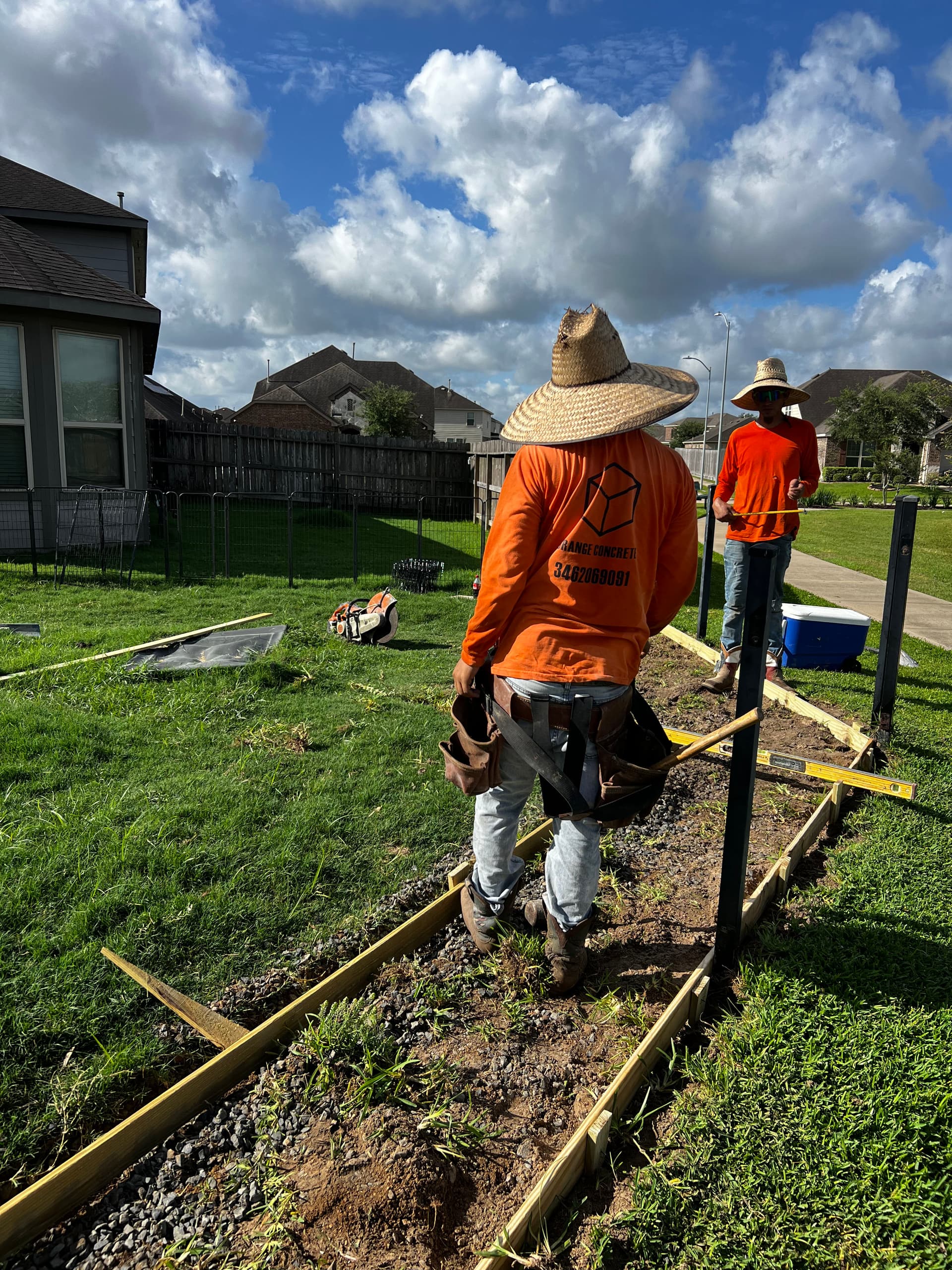 Gallery photos for Stamped Concrete Walkway That Stopped a Dog From Digging Under the Fence: Image #3