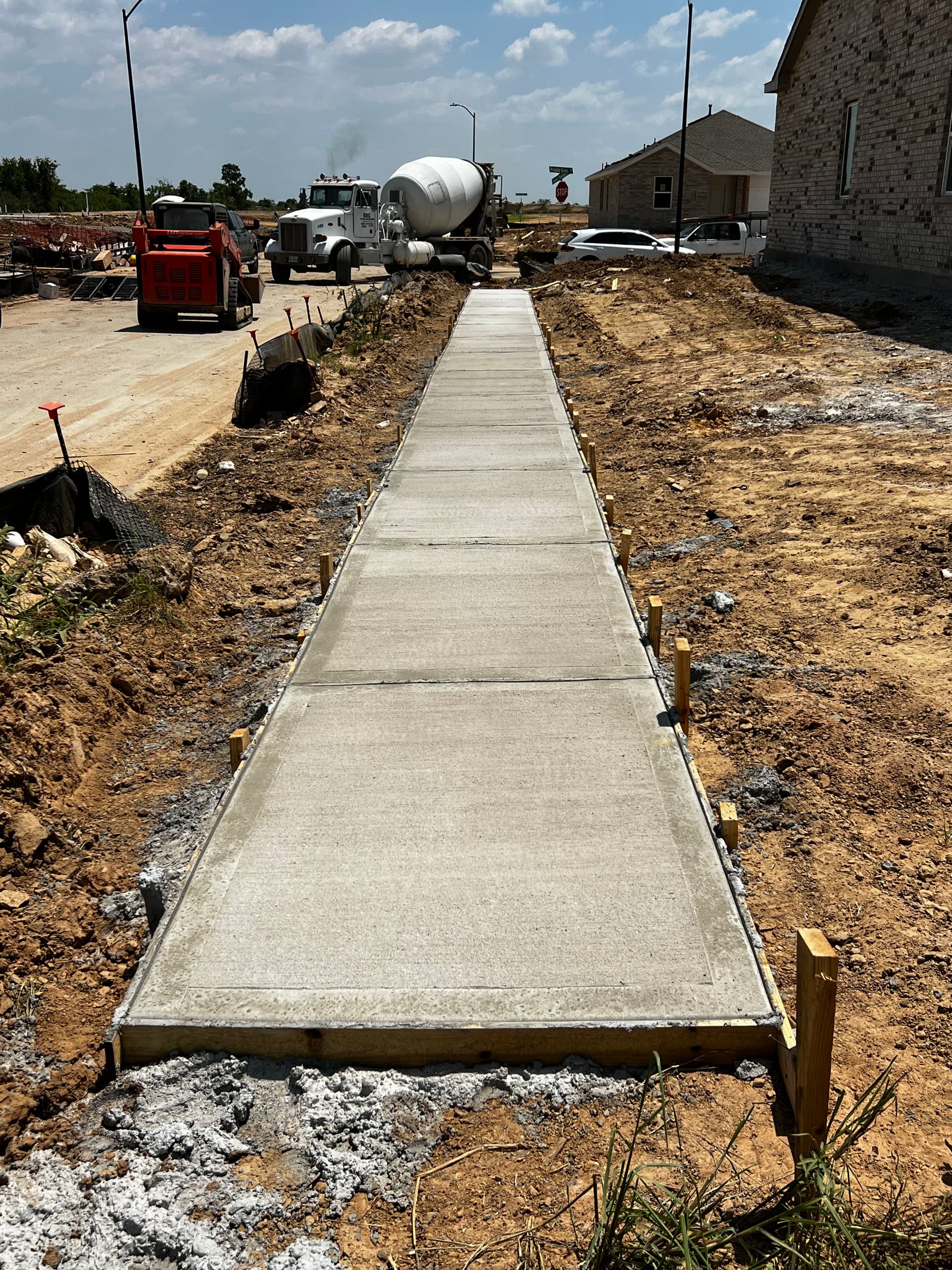 Gallery photos for Pouring Concrete Slabs and Sidewalks for a Growing Neighborhood: Image #1