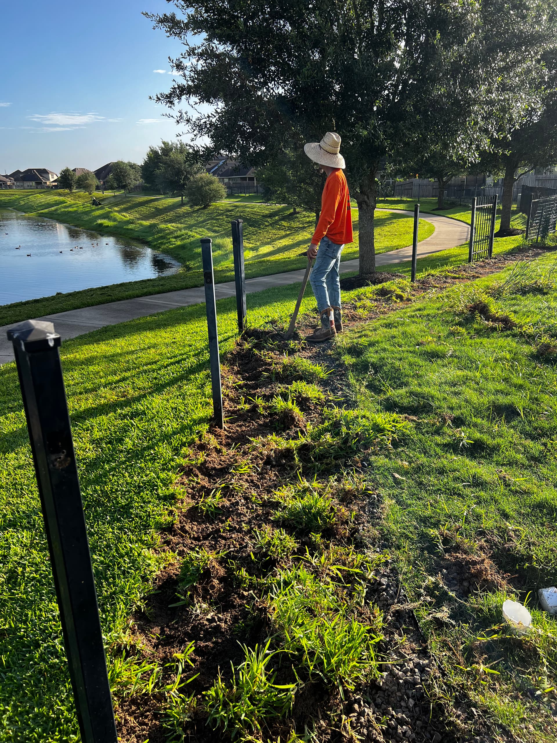 Gallery photos for Stamped Concrete Walkway That Stopped a Dog From Digging Under the Fence: Image #2